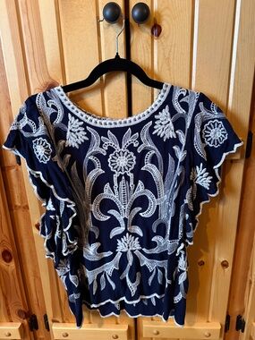 Solitaire Navy Blue Top with White Embroidered Floral Design